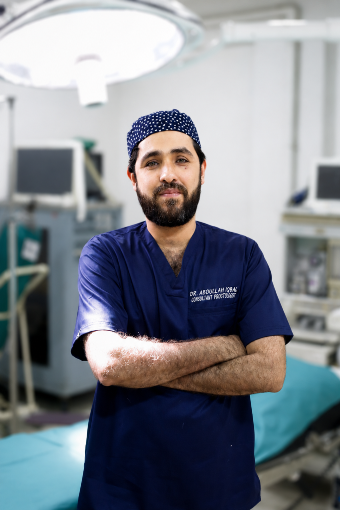 Dr. Abdullah Iqbal apne clinic mein